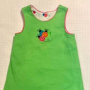 Toddler sundress with lady bug appliqué